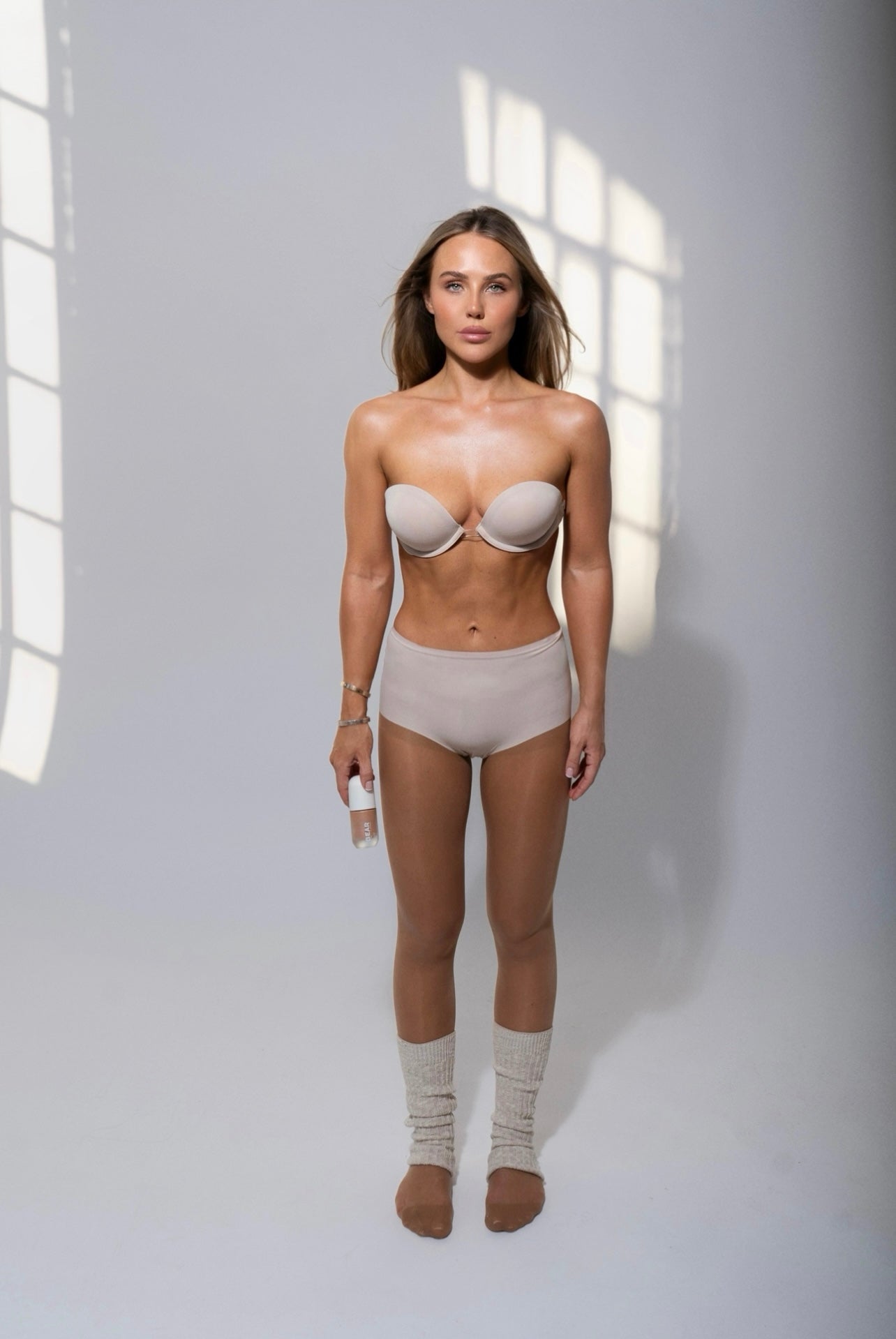 Girl wearing strapless bra and high waisted knickers 